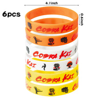 PANTIDE 74Pcs Karate Taekwondo Party Favors Supplies Set Silicone Rubber Bracelet Keychain Button Pins Badges Stickers TV Show Strike First Strike Hard No Mercy Karate Theme Birthday Dress Up for Kids